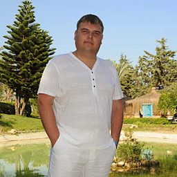 AT
